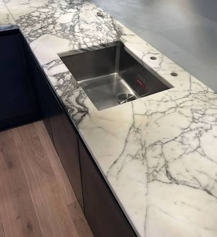 White marble flooring installation in Bengaluru home by Sharma Exports natural stone supplier